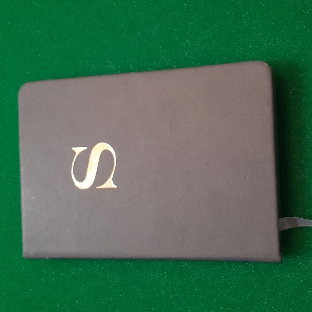 Notebook hardback with a gold initial S